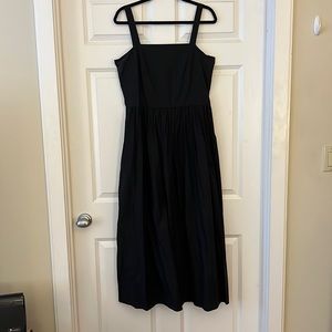 COS black poplin midi dress with shirred detail at skirt. Classic LBD!